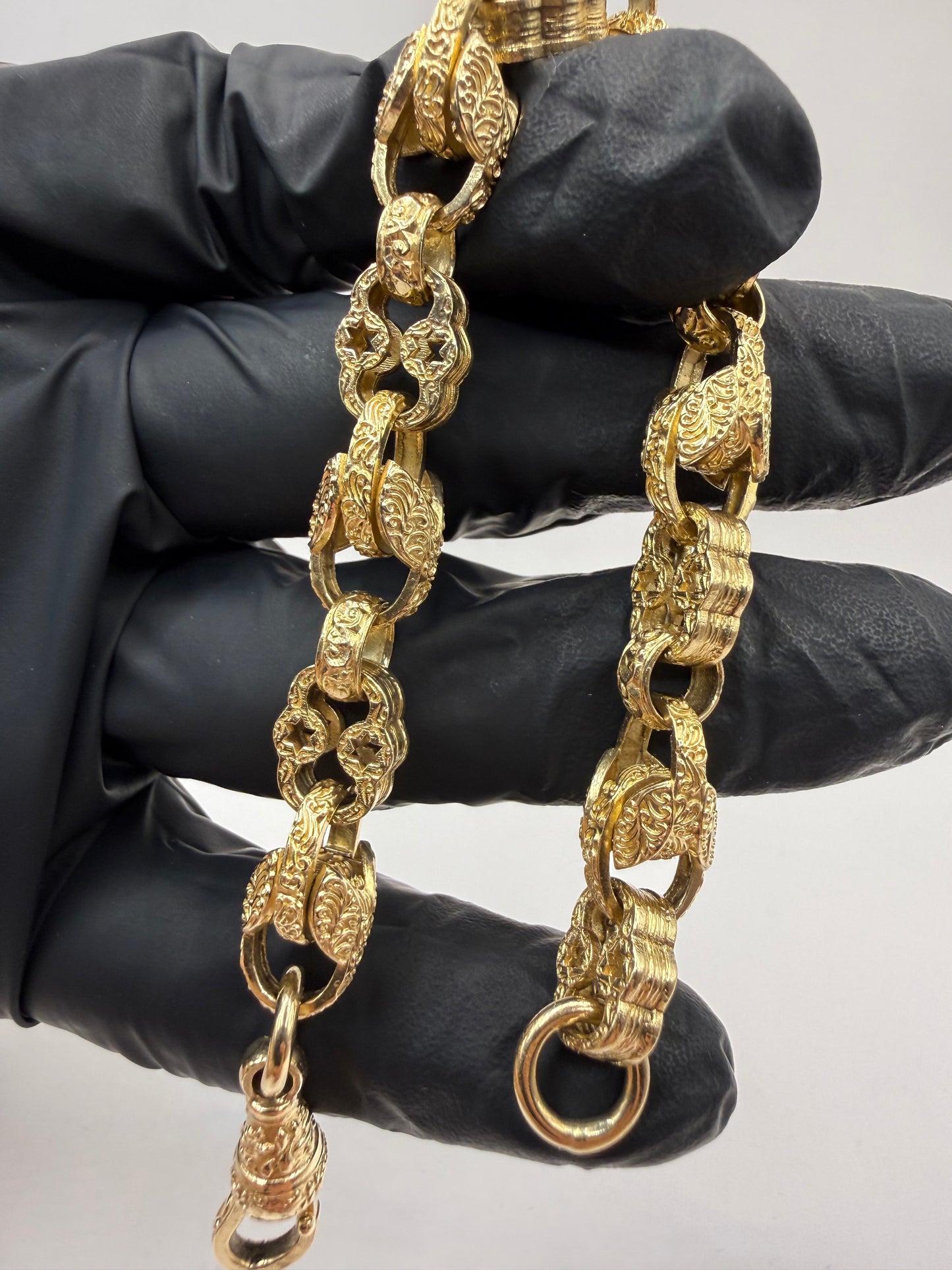 9ct Gold Curb Stars & Tulip Bracelet 8" 9mm 27.5g